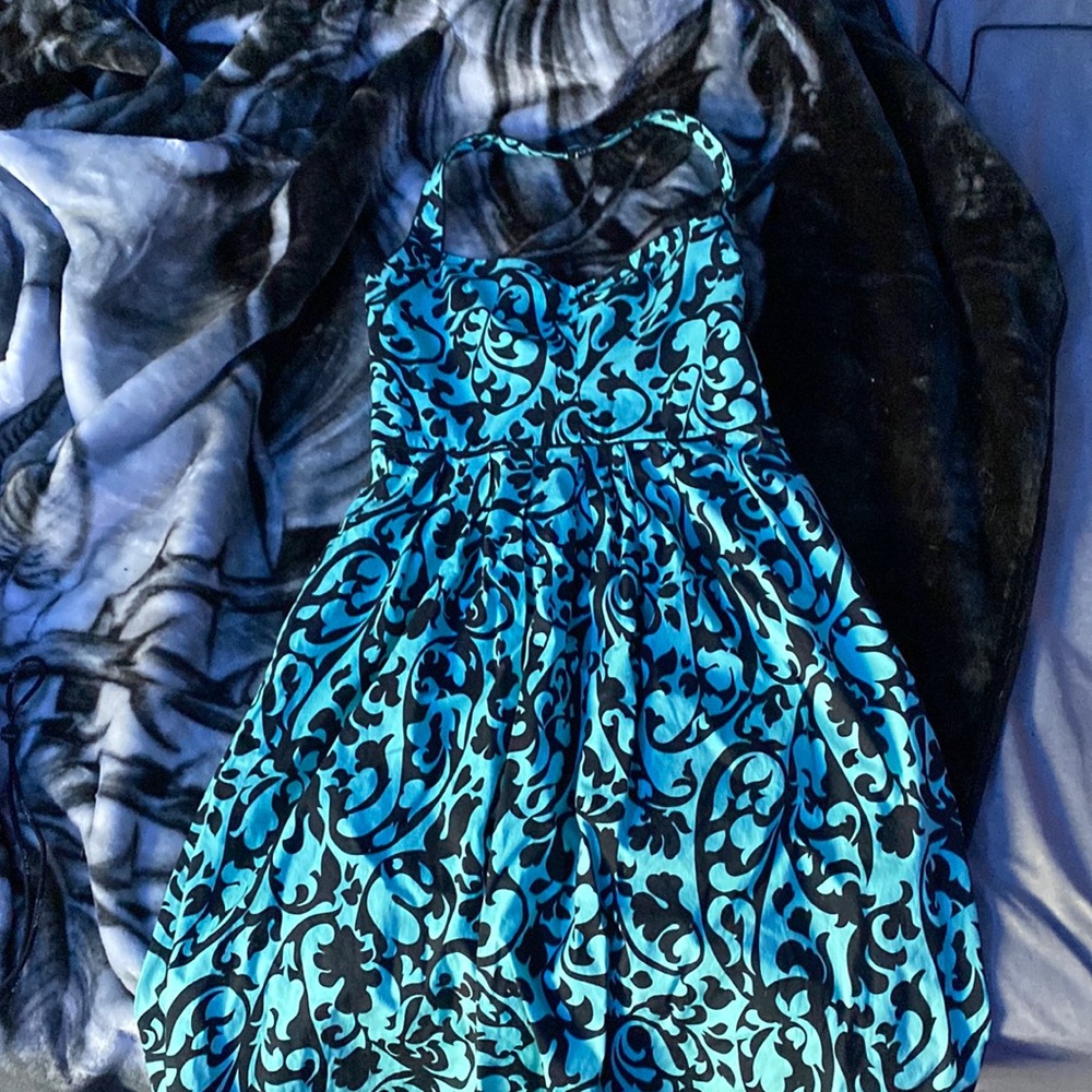 A black and turquoise dress